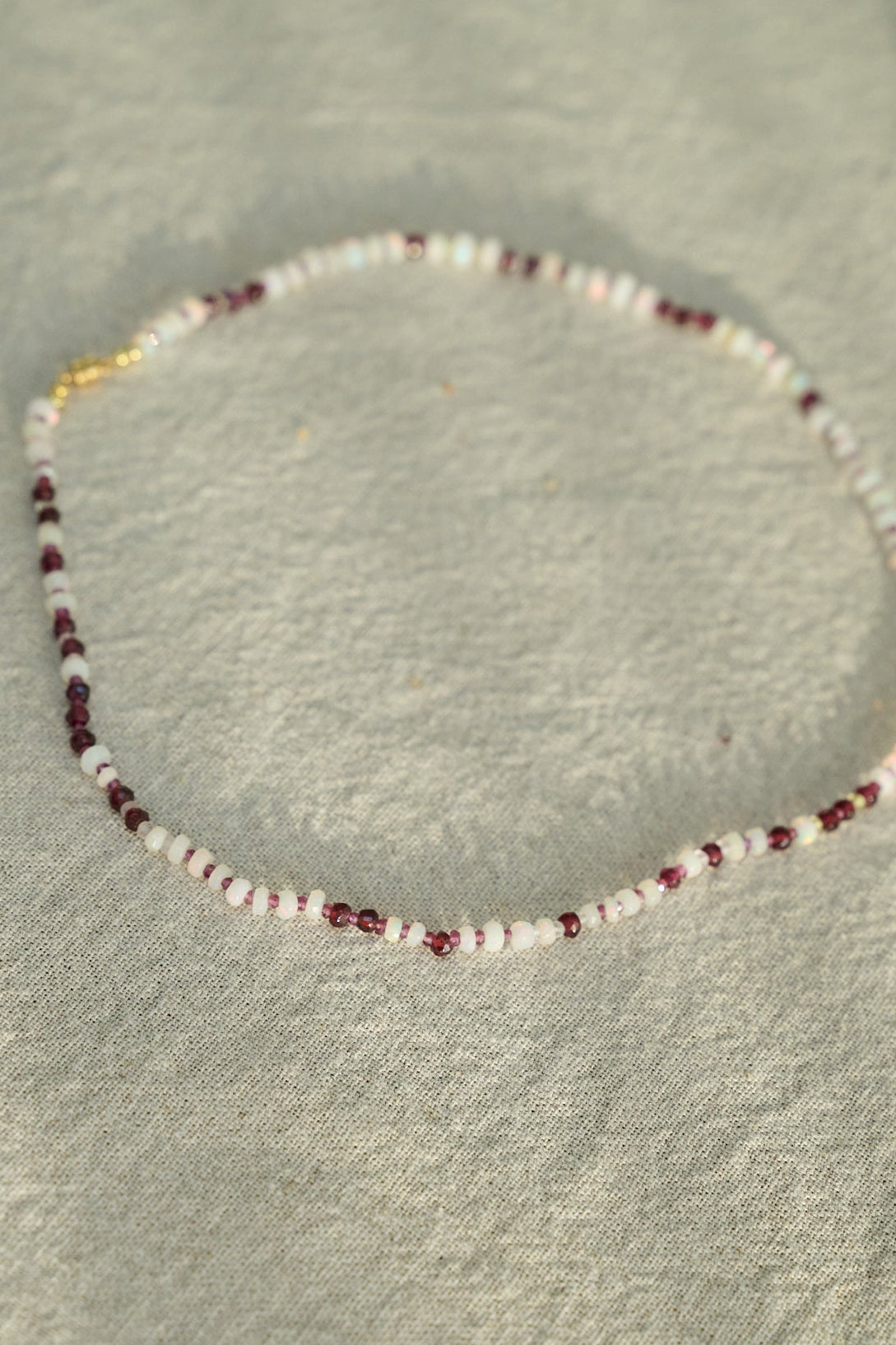 Ethiopian fire opal, garnet and sapphire necklace